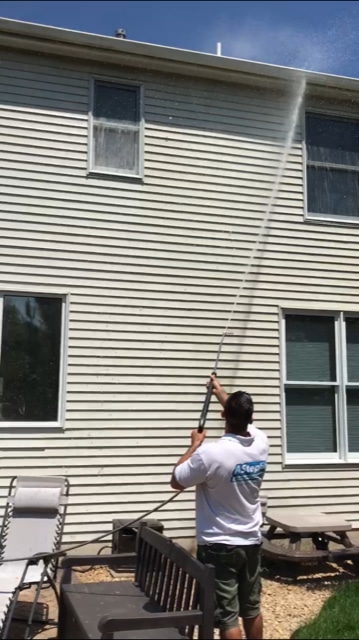 Power washing siding